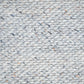 Artisan hand weaving traditional woolen carpet, Rajasthan India