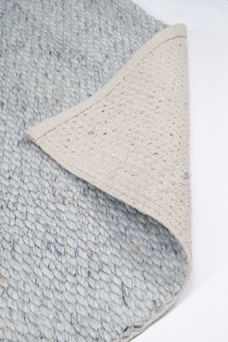 Handwoven woolen area rug size comparison 5x8 ft vs 7'9x10 ft